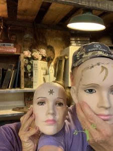 two masks at junk shop