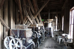 interior topaz mill with roller mills and grist mill on end