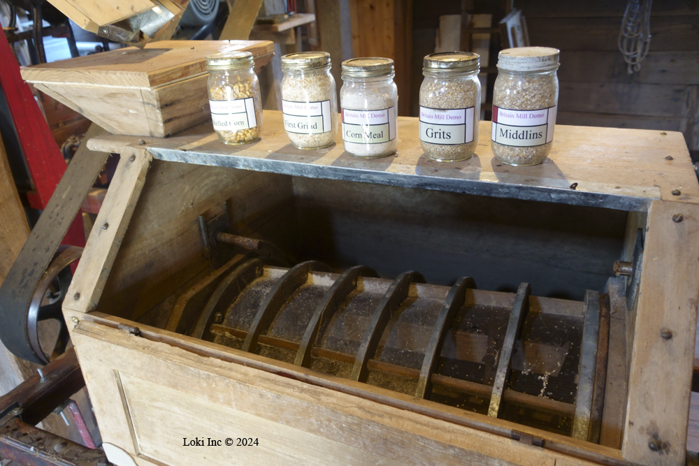 Britain Mill grist mill product samples atop bran duster