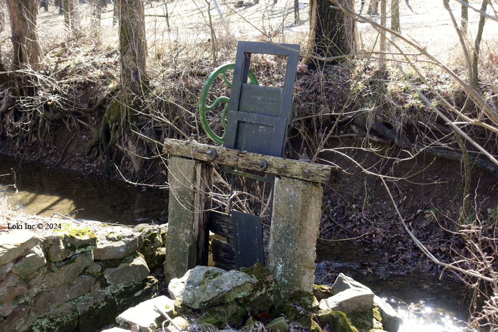 Small weir for undershot wheel race at Britain Mill